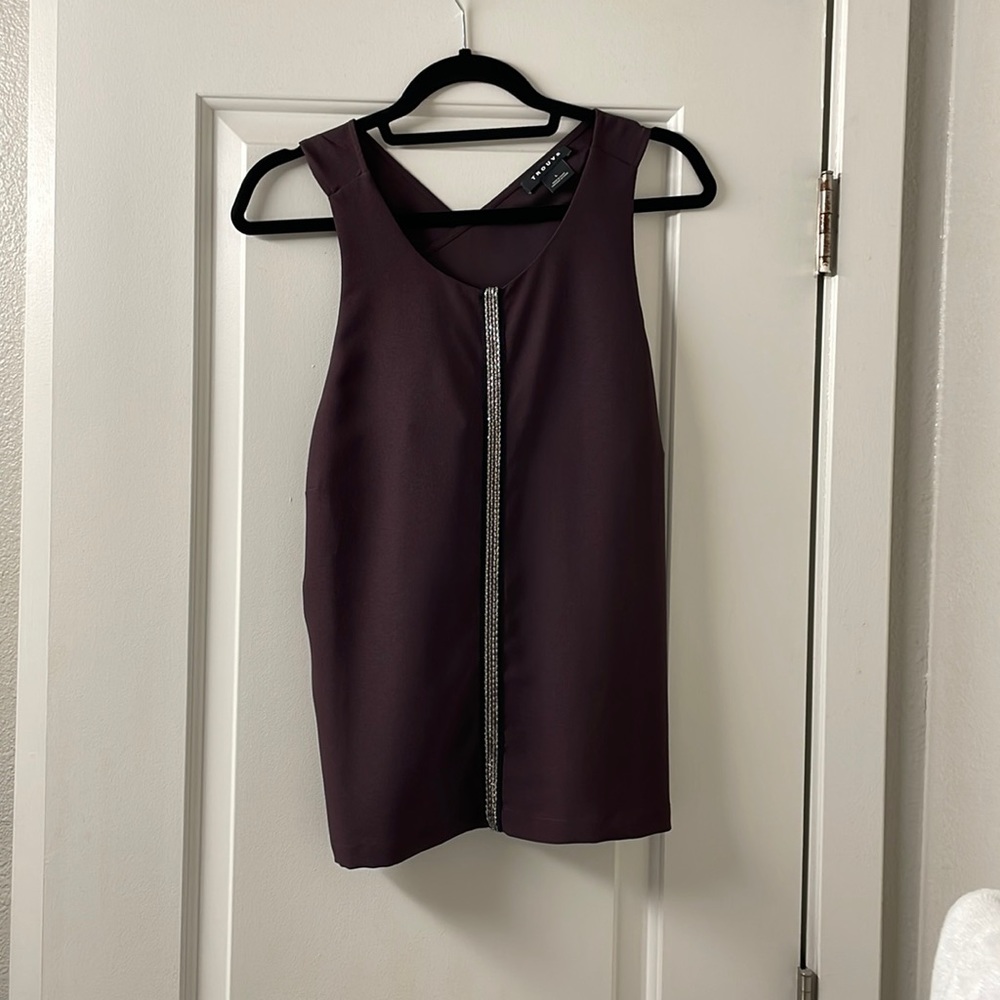 Trouve tank with open back